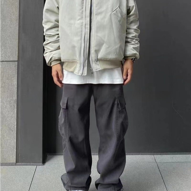 Loose Fitting Casual Straight Leg Cargo Pants With Multiple Pockets And A Drawstring Waist